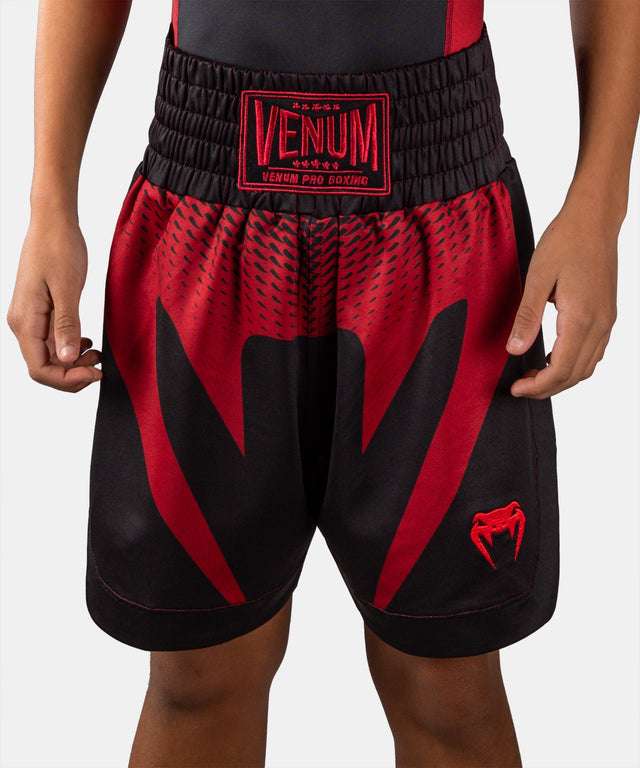 Pantaloni scurți de box Venum Attack – Copii – Negru/Roșu