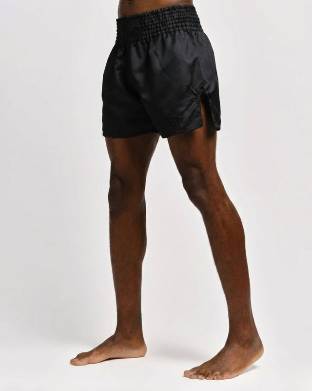 Caged Muay-Thai-Shorts Classic – Schwarz/Schwarz