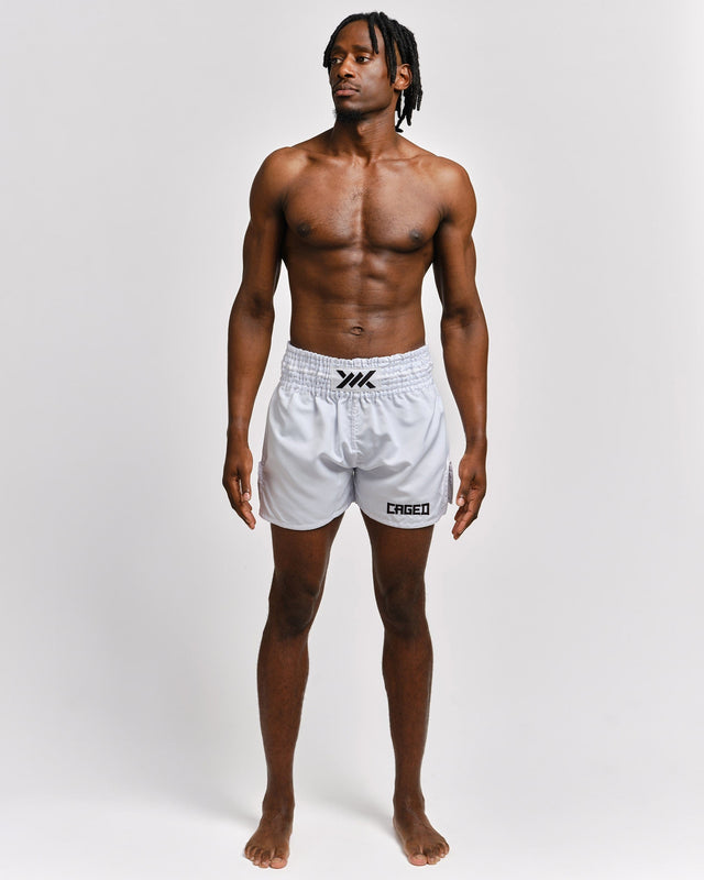 Spodenki Muay Thai Caged Classic – Białe/Czarne
