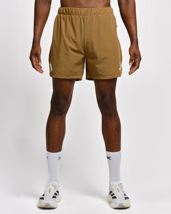 Caged Stride 2-in-1 Løbeshorts - Olivengrøn