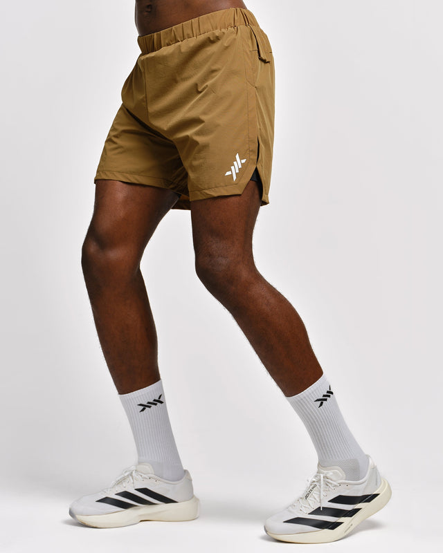 Caged Stride 2-in-1 Løbeshorts - Olivengrøn