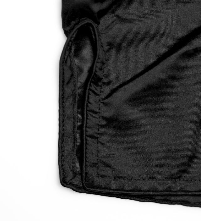 Caged Muay-Thai-Shorts Classic – Schwarz/Weiß