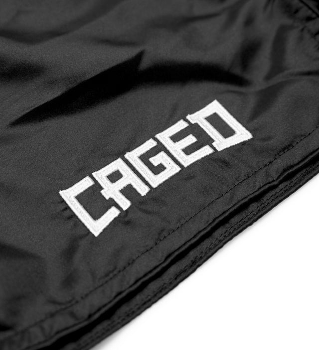 Caged Muay-Thai-Shorts Classic – Schwarz/Weiß