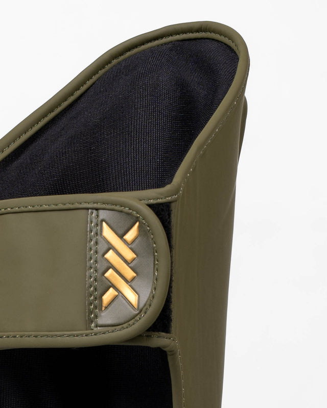 Caged Schienbeinschoner Spark Kinder – Khaki/Gold