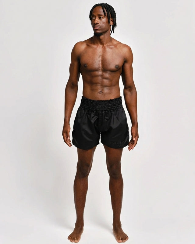 Caged Muay-Thai-Shorts Classic – Schwarz/Schwarz