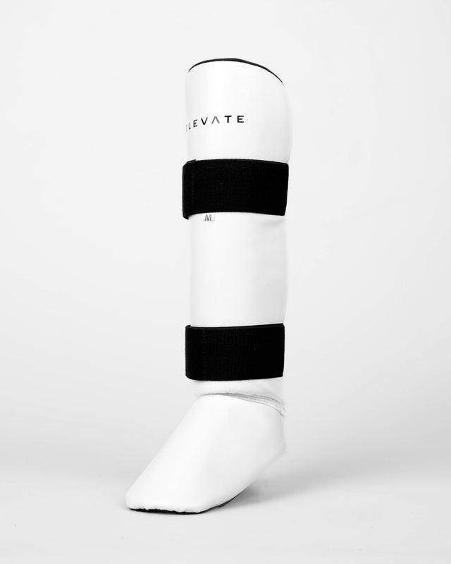 Espinilleras Elevate Prime – Blanco