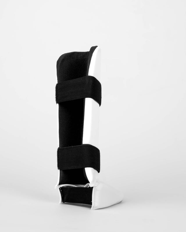 Espinilleras Elevate Prime – Blanco