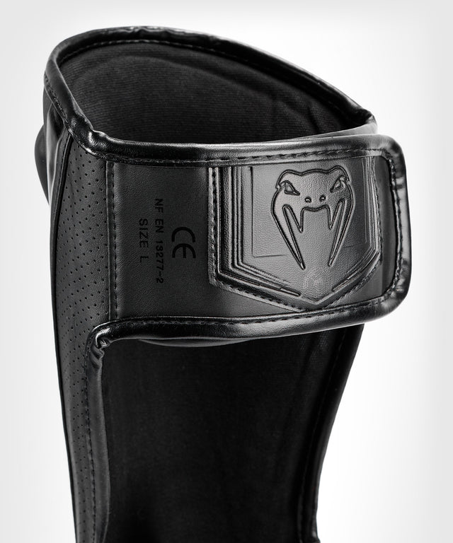 Espinilleras Venum Elite Evo – Negro/Negro