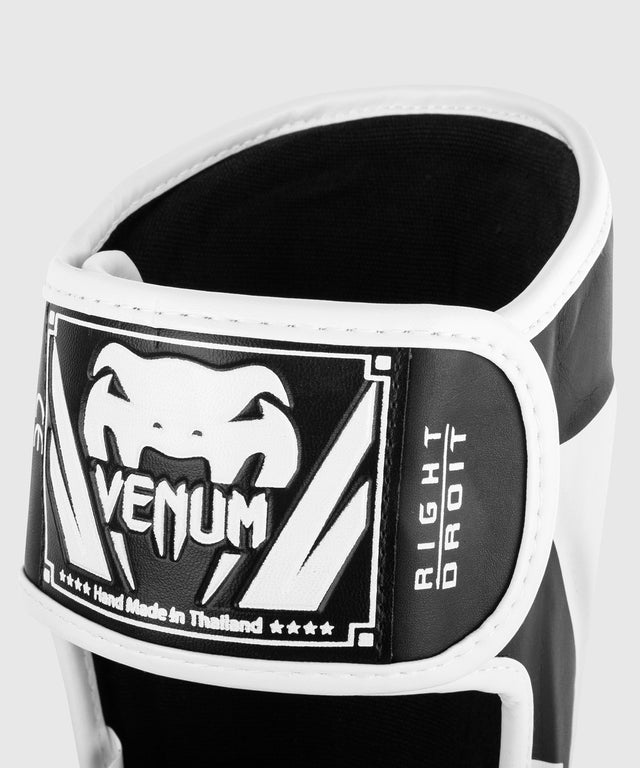 Caneleiras Venum Elite – Preto/Branco