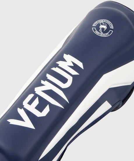 Protège-tibias Venum Elite – Bleu marine/Blanc