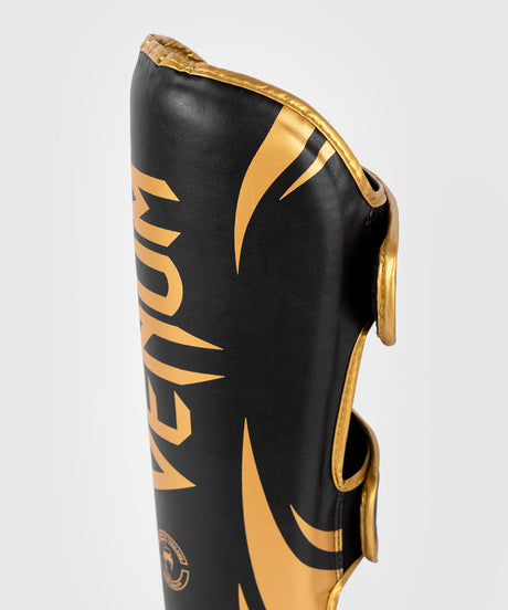 Caneleiras de kickboxing Venum Challenger – Preto/Ouro