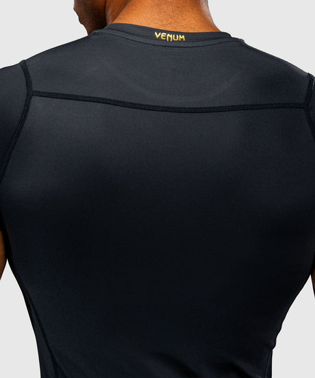 Rashguard Venum Attack Mangas Curtas – Preto/Ouro