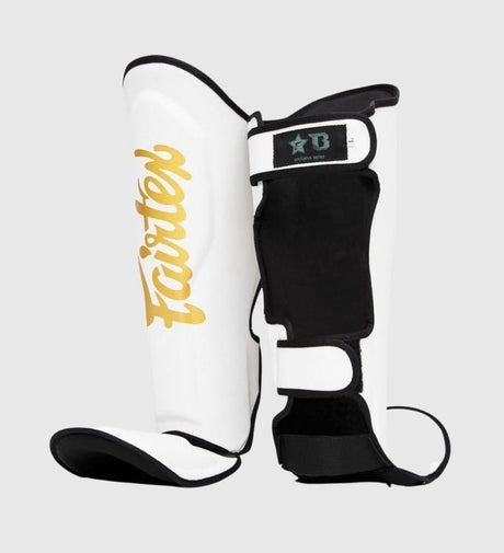 Paratibie da kickboxing Fairtex FXB – Bianco/Oro – Paratibie da kickboxing