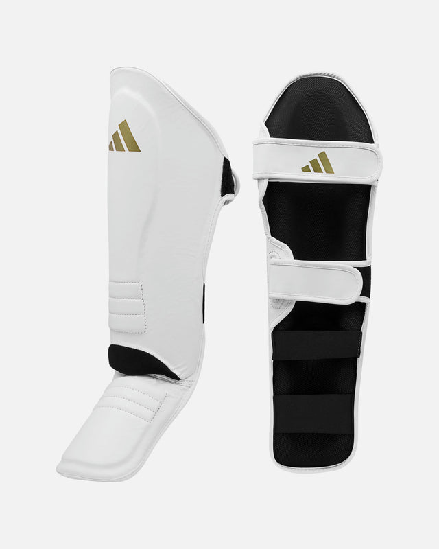 Caneleiras Adidas Speed Thai Shin-n-Step – Branco/Ouro