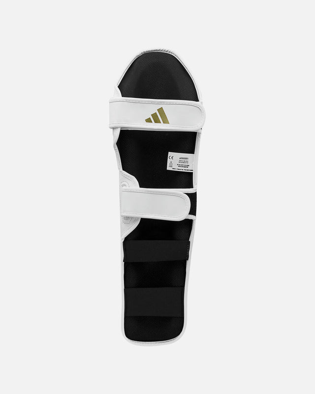 Caneleiras Adidas Speed Thai Shin-n-Step – Branco/Ouro