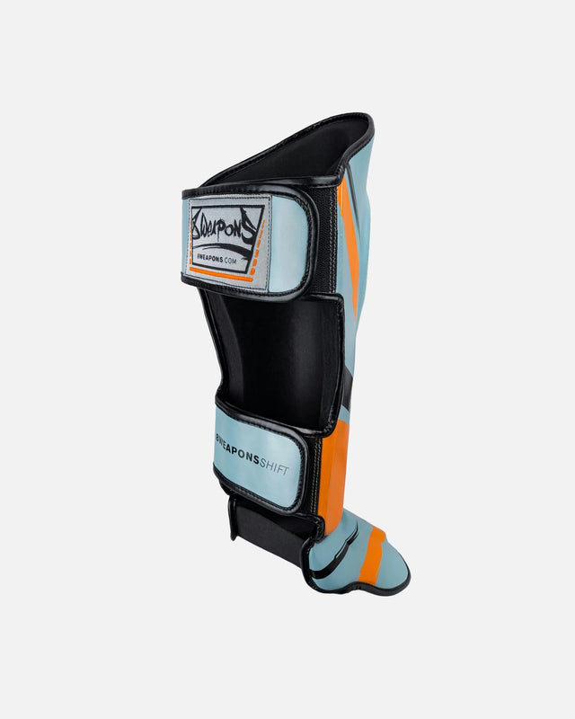 8 WEAPONS Schienbeinschoner Shift – Eisgrau/Orange